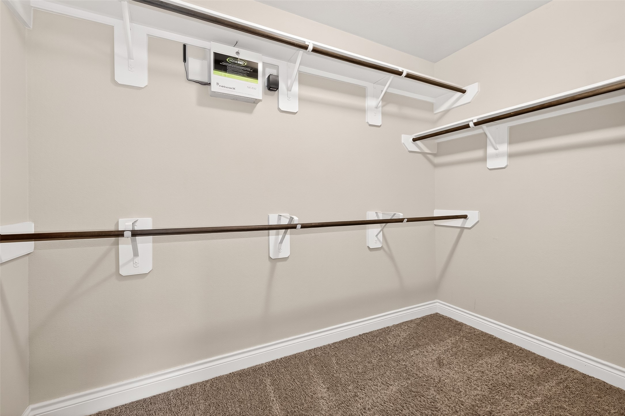24122 Valencia Ridge Lane Katy, TX 77494 - Photo 42 of 48 a view of small space with racks on the wall