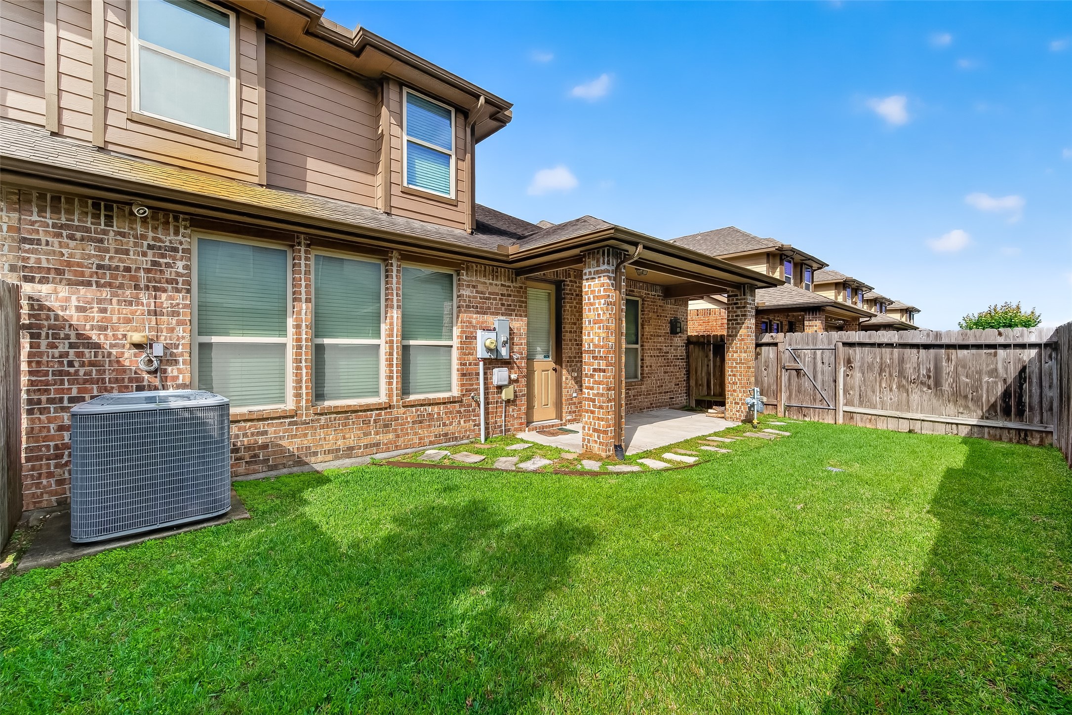 24122 Valencia Ridge Lane Katy, TX 77494 - Photo 47 of 48 a view of a house with a yard and deck
