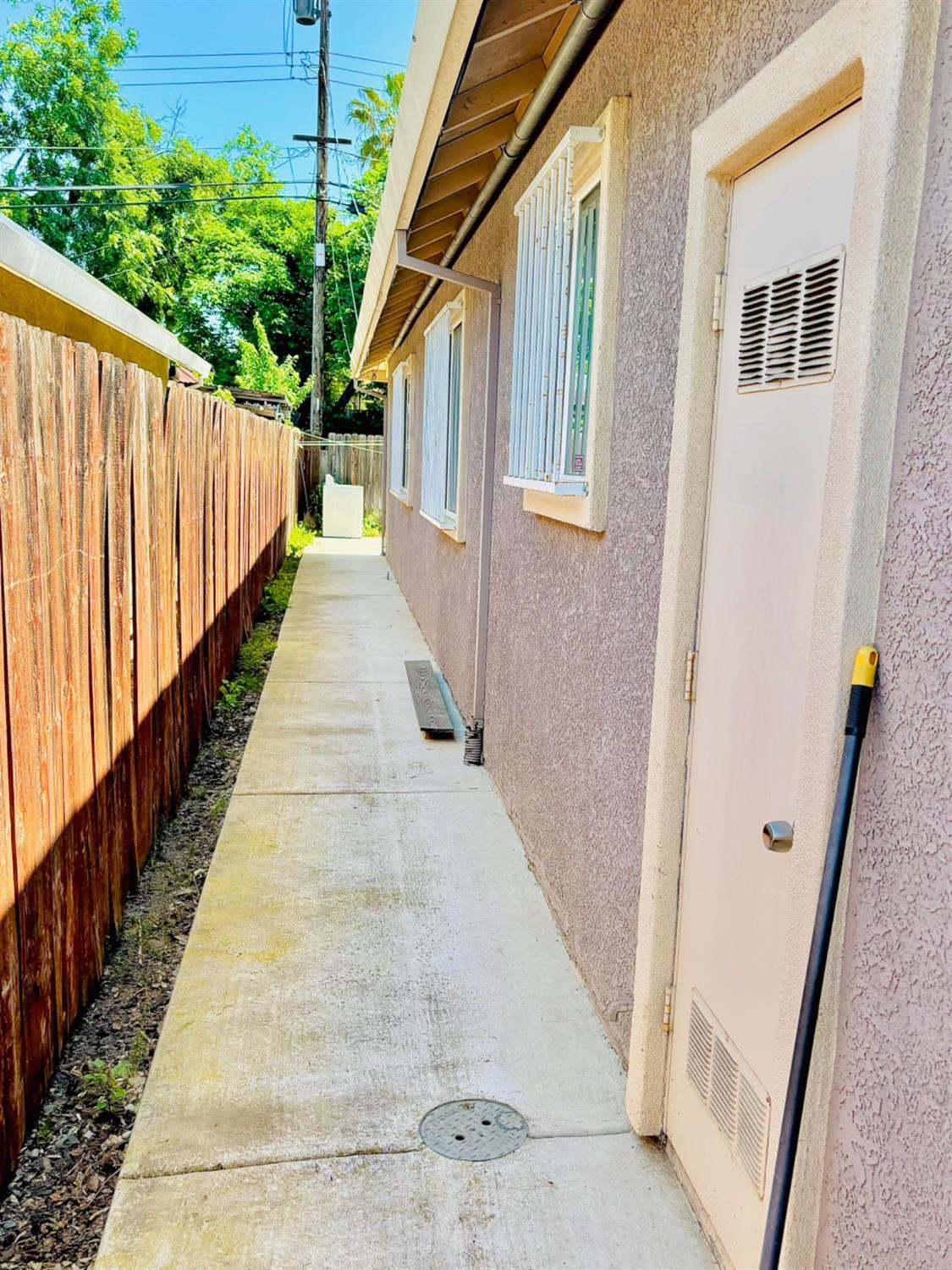 3416 Rio Linda Boulevard Sacramento, CA 95838 - Photo 12 of 13 a view of a pathway of a house with stairs