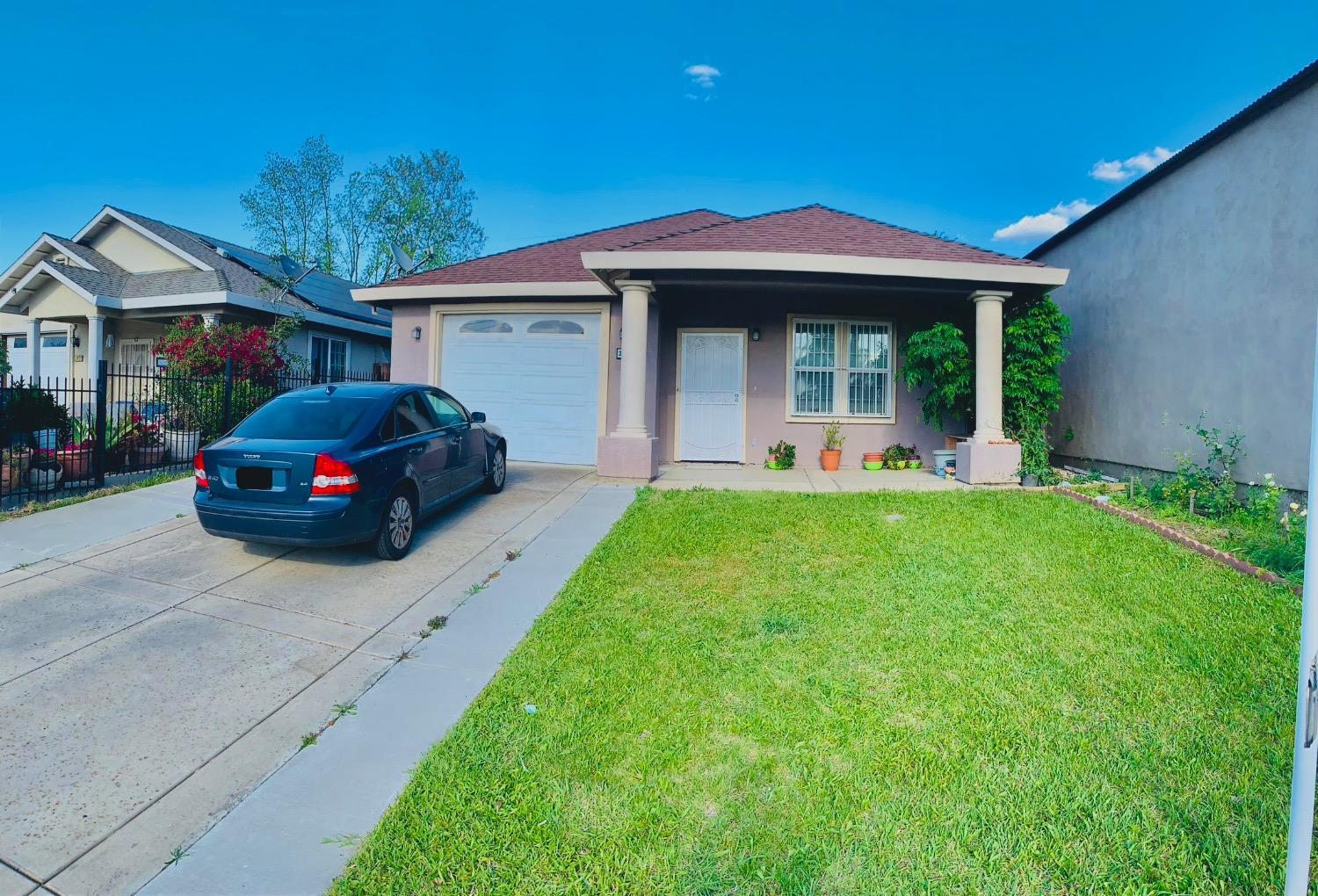 3416 Rio Linda Boulevard Sacramento, CA 95838 - Photo 2 of 13 a front view of a house with garden