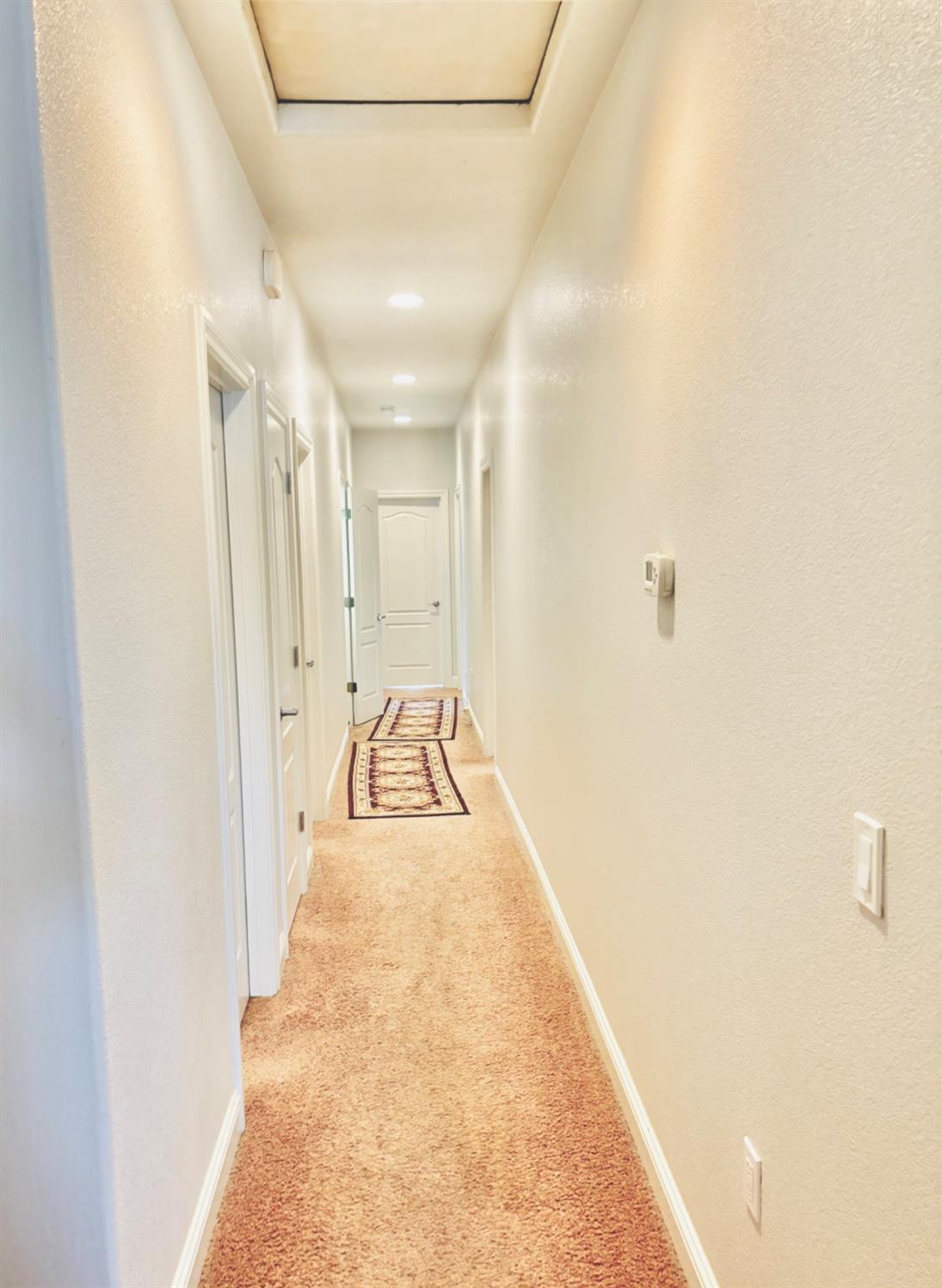 3416 Rio Linda Boulevard Sacramento, CA 95838 - Photo 10 of 13 a view of a hallway with a white walls