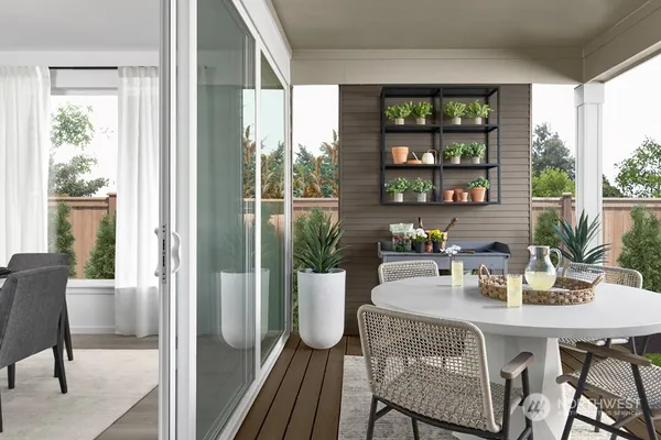 a view of a dining room with furniture window and outside view