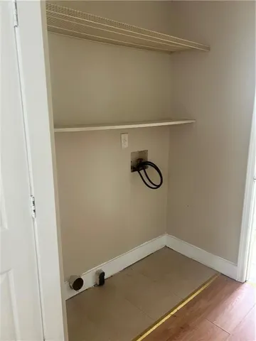 a view of a yard with plants and a small yard