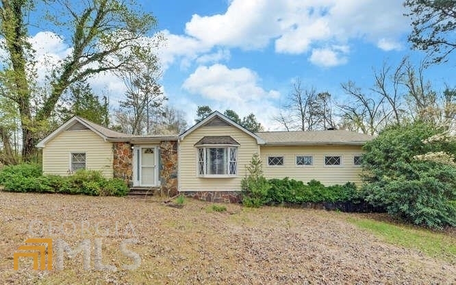 5785 Mize Road Toccoa, GA 30577 - Photo 1 of 1 front view of a house with a yard