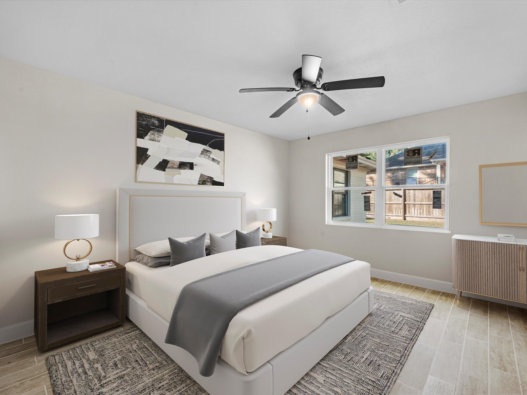 9096 North Comanche Circle Willis, TX 77378 - Photo 16 of 30 Master Bedroom continues with the tile flooring and new windows to the backyard