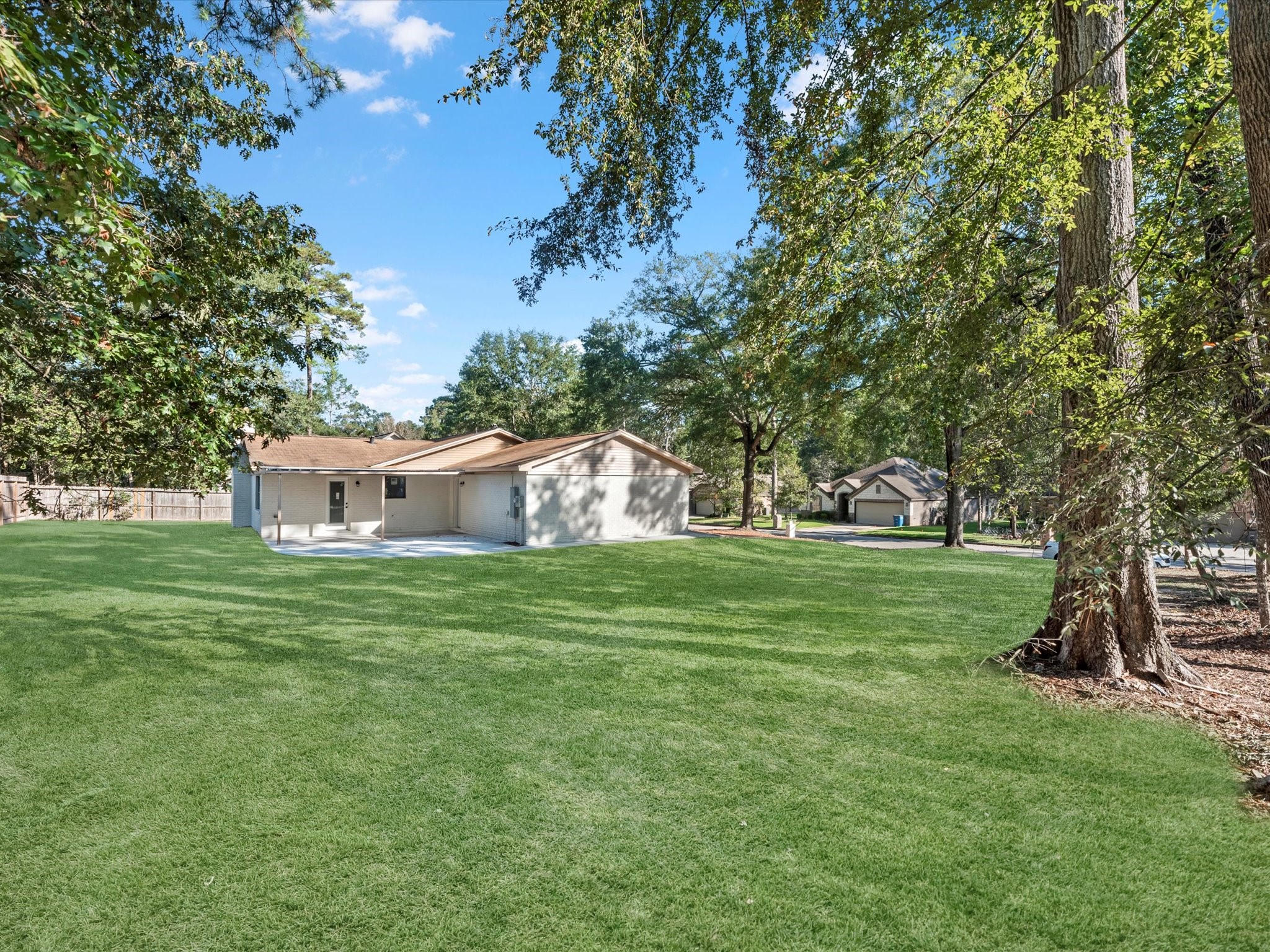 9096 North Comanche Circle Willis, TX 77378 - Photo 27 of 30 This backyard is actually a DOUBLE LOT!!! Plenty of options for a pool, play area for the kids or RV storage