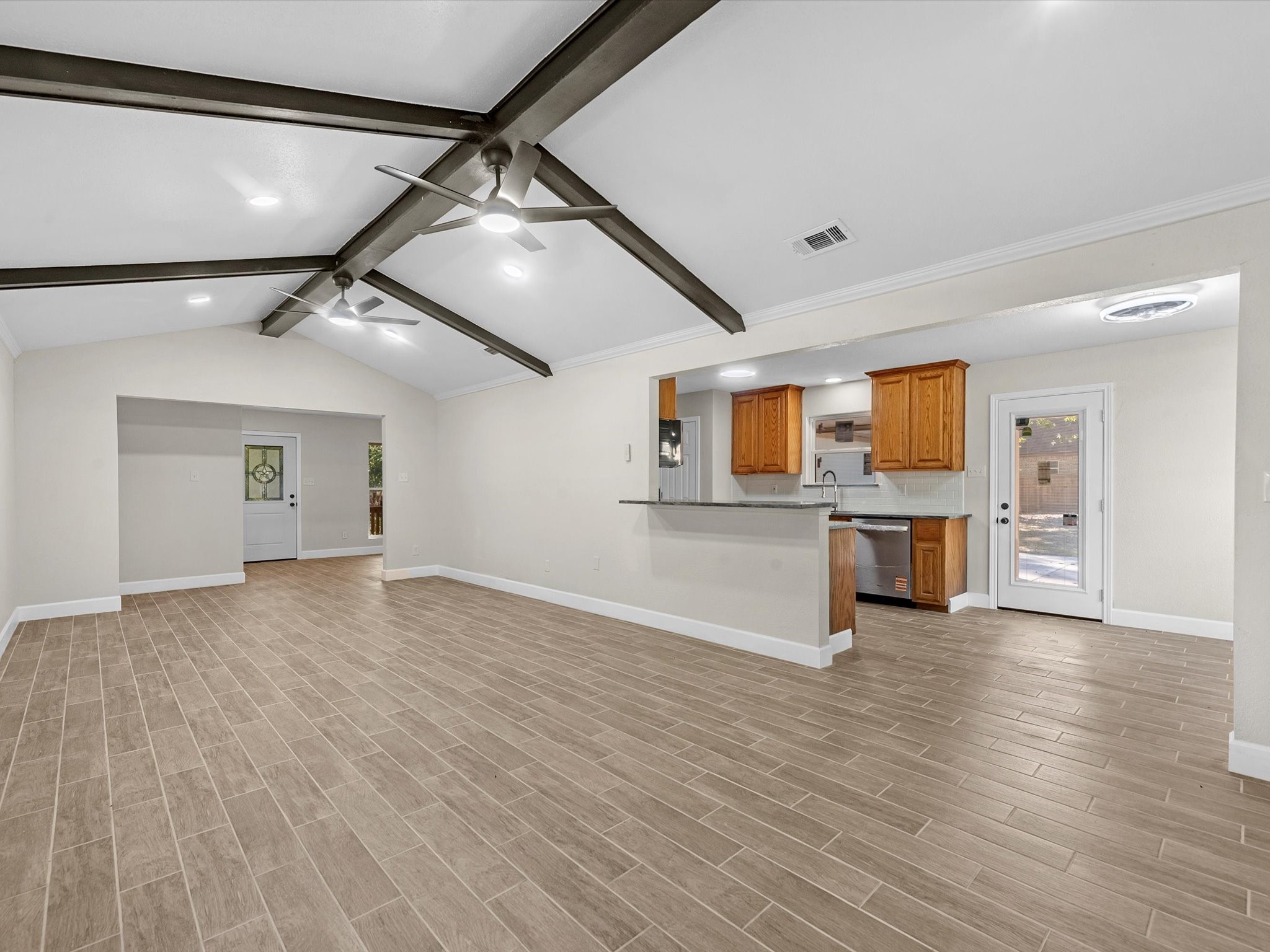 9096 North Comanche Circle Willis, TX 77378 - Photo 9 of 30 View from Great Room to the Front Door and the Kitchen