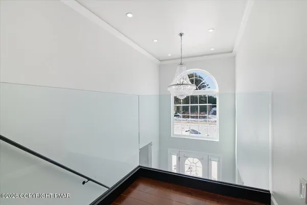 a view of a dining room with furniture and a livingroom