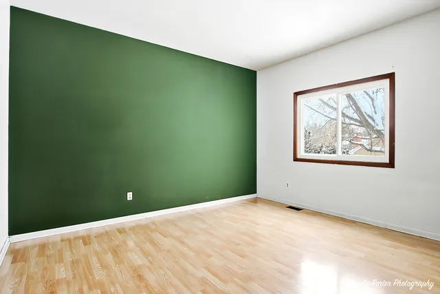 a view of a big room with window and ample daylight