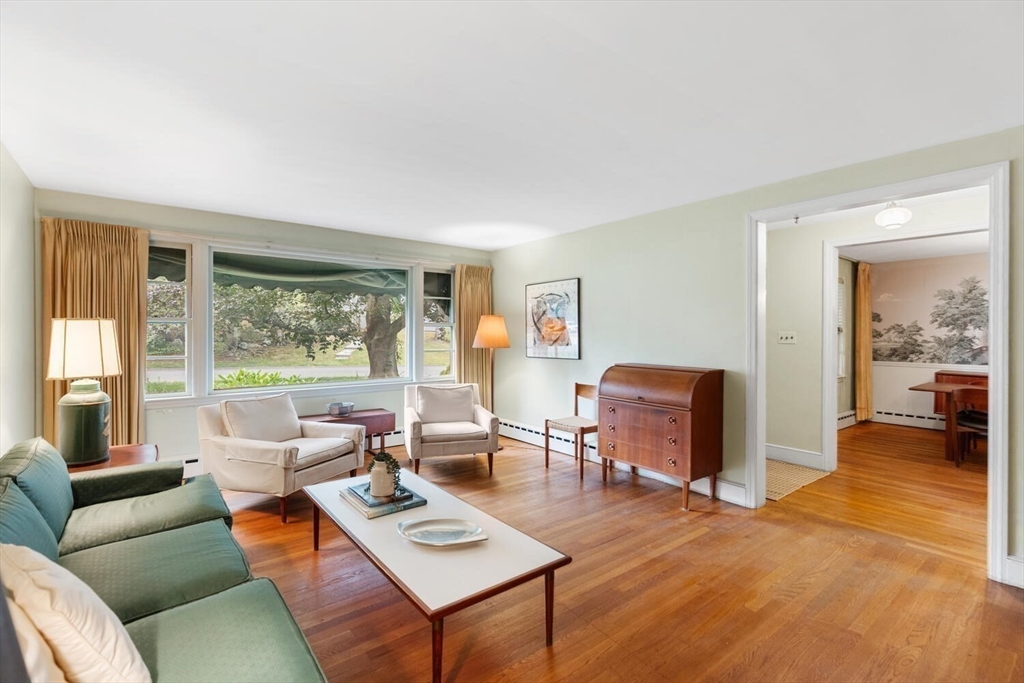 19 Crescent Road Lexington, MA 02421 - Photo 11 of 29 a living room with furniture and a large window