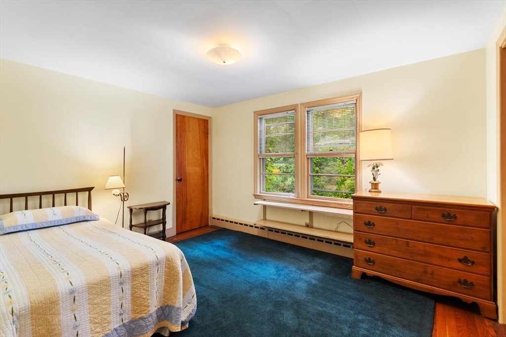 19 Crescent Road Lexington, MA 02421 - Photo 17 of 29 a bedroom with a bed and a window