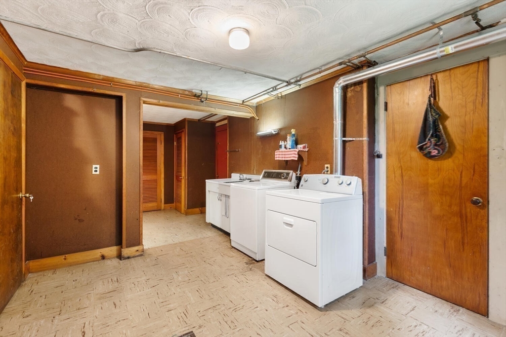19 Crescent Road Lexington, MA 02421 - Photo 22 of 29 a bathroom with a sink mirror and shower
