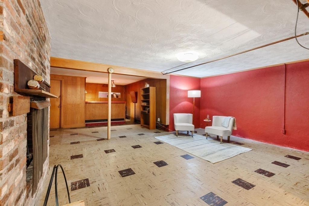 19 Crescent Road Lexington, MA 02421 - Photo 23 of 29 a bedroom with a bed and a dresser