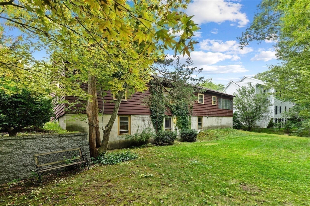 19 Crescent Road Lexington, MA 02421 - Photo 27 of 29 a view of a house with a yard