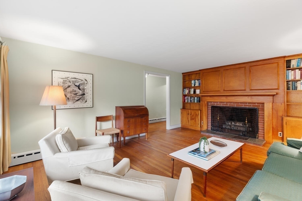 19 Crescent Road Lexington, MA 02421 - Photo 9 of 29 a living room with furniture and a fireplace