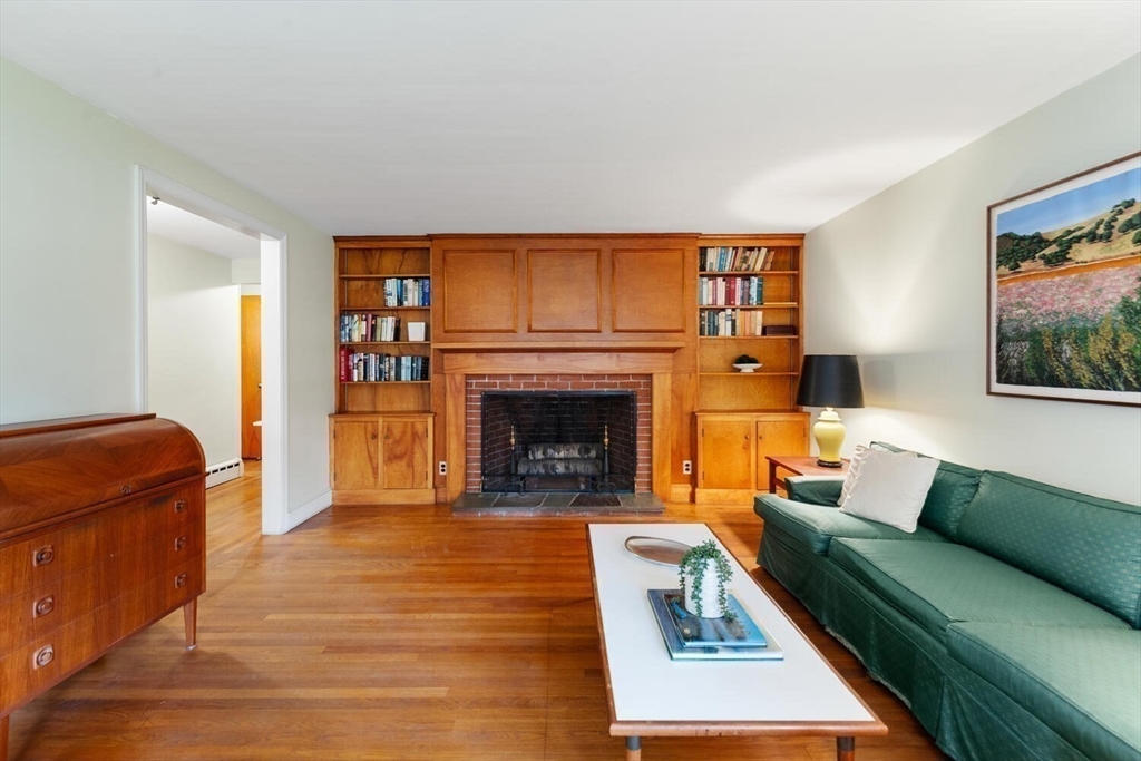19 Crescent Road Lexington, MA 02421 - Photo 10 of 29 a living room with furniture and a fireplace