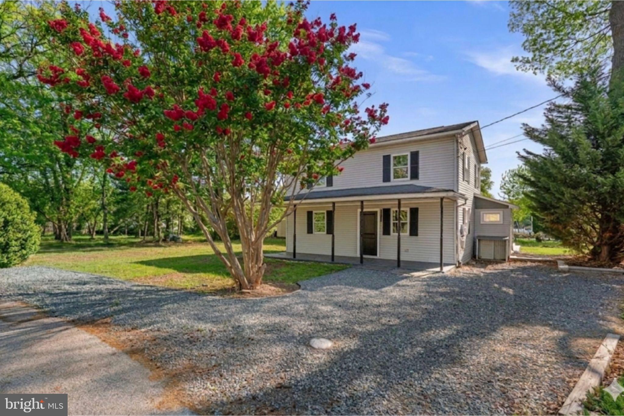 2636 Haddaway Road Sparrows Point, MD 21219 - Photo 1 of 43 a front view of a house with garden