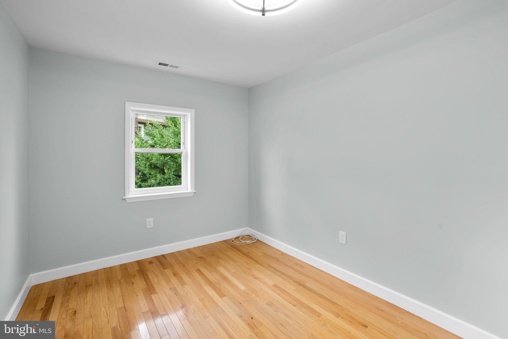 2636 Haddaway Road Sparrows Point, MD 21219 - Photo 28 of 43 a view of empty room with wooden floor
