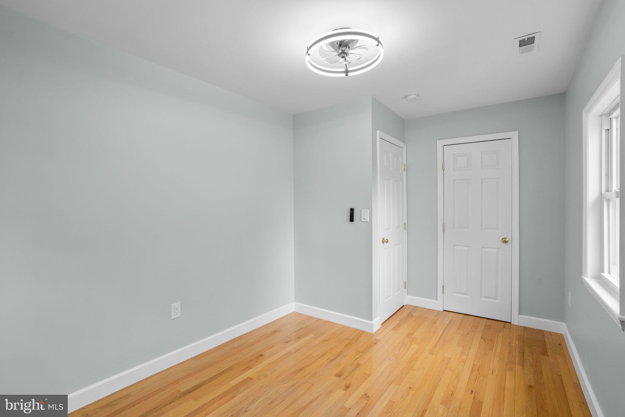 2636 Haddaway Road Sparrows Point, MD 21219 - Photo 29 of 43 a view of empty room with wooden floor
