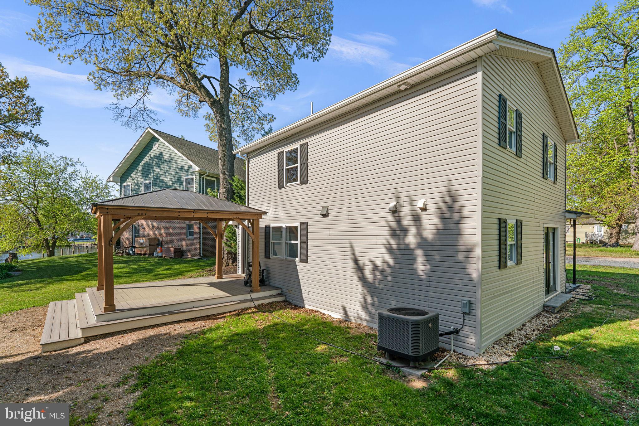 2636 Haddaway Road Sparrows Point, MD 21219 - Photo 35 of 43 a front view of a house with a garden