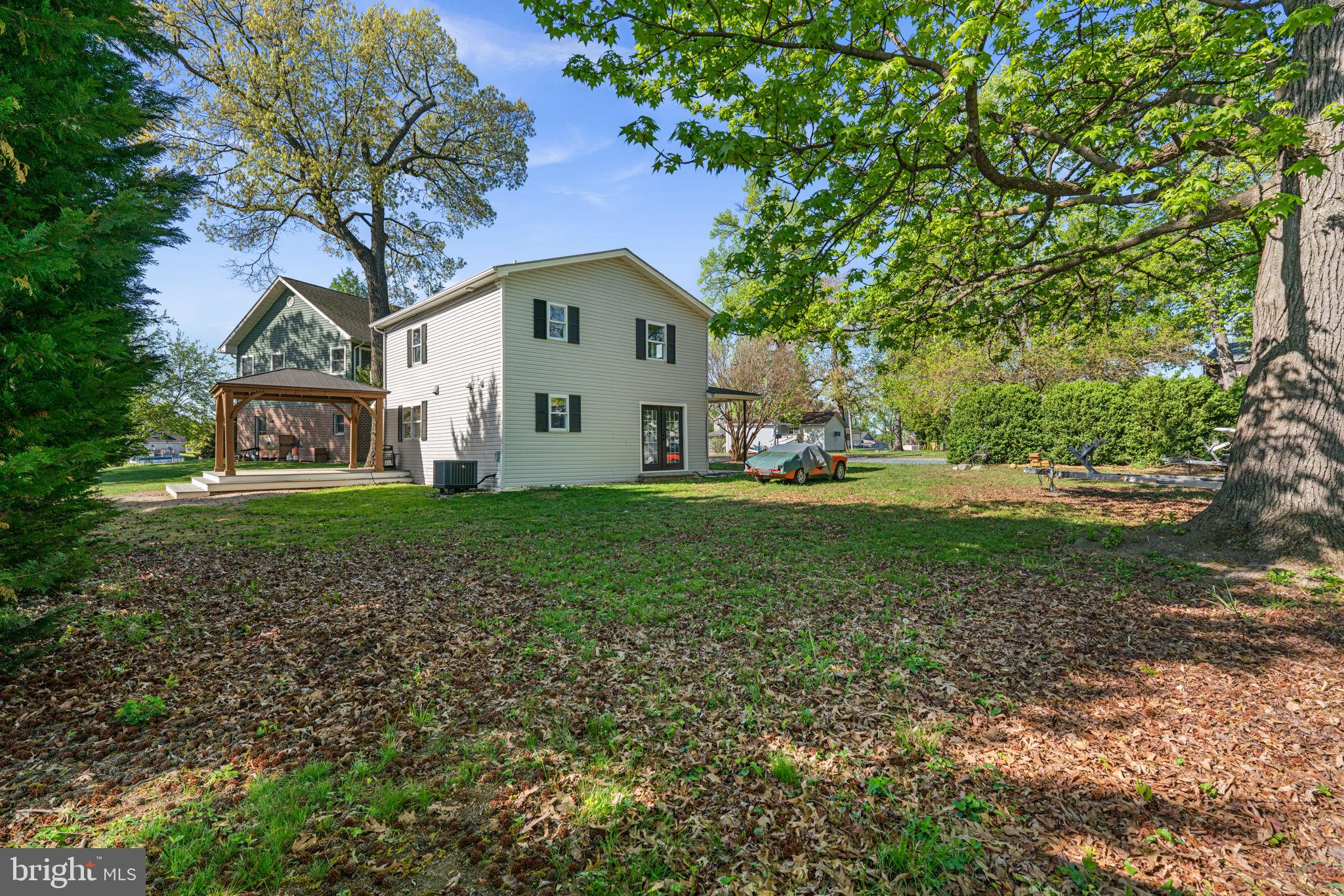 2636 Haddaway Road Sparrows Point, MD 21219 - Photo 37 of 43 a front view of house with yard and green space