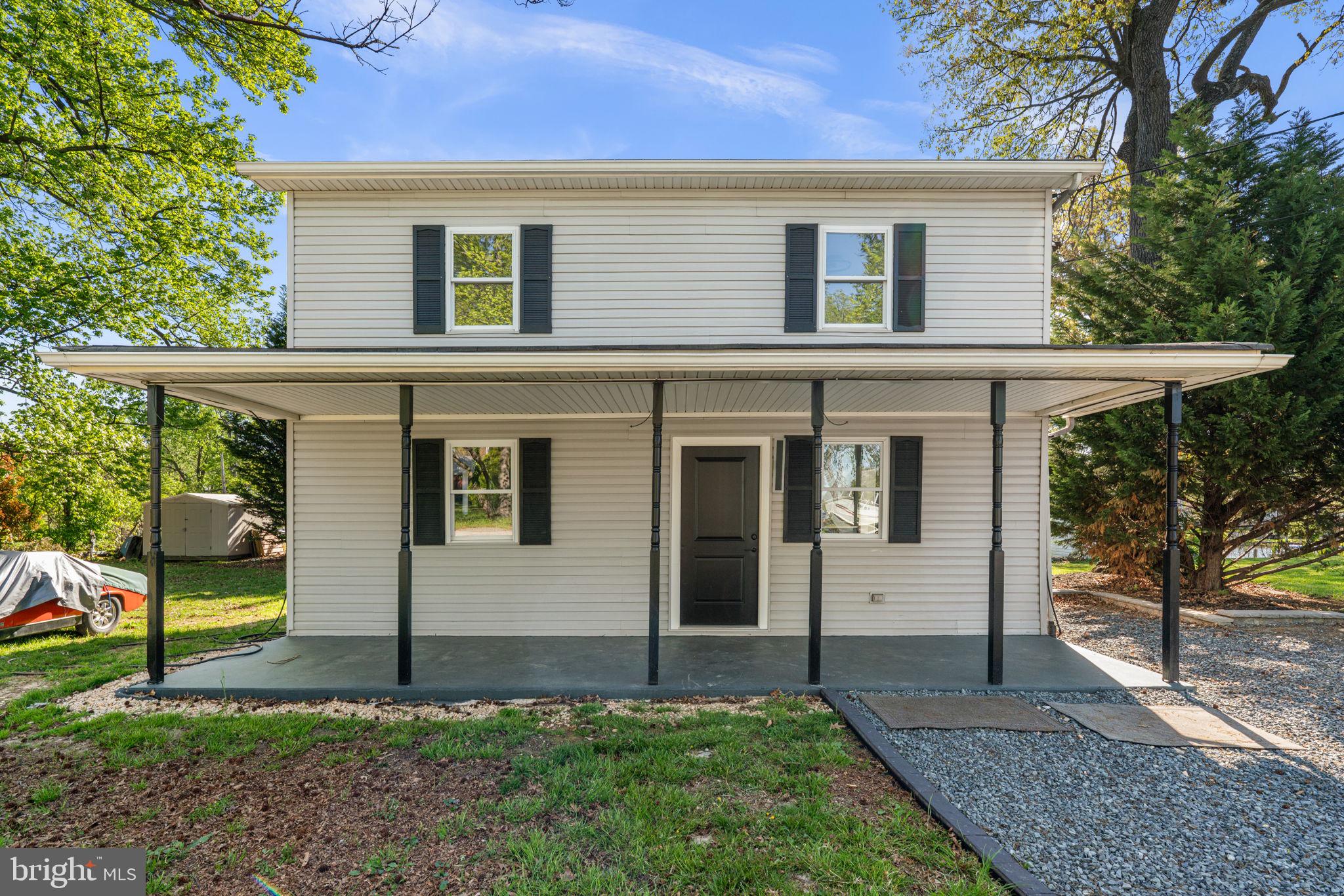 2636 Haddaway Road Sparrows Point, MD 21219 - Photo 38 of 43 a front view of a house with a yard