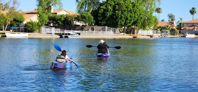 a view of a lake with houses