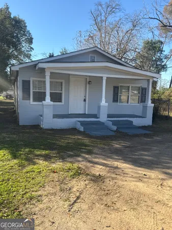 a view of house with ocean view