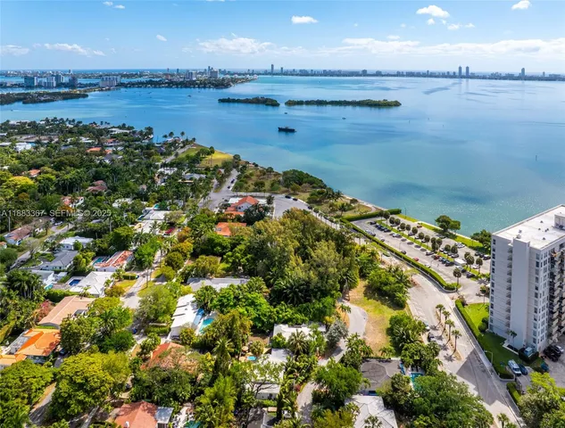 a view of an ocean and city
