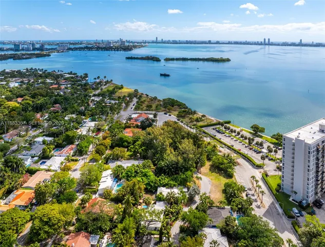 a view of an ocean and city