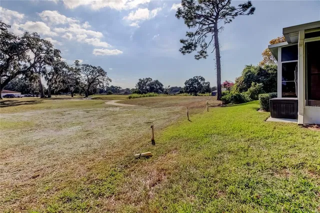 a view of a lake with a big yard