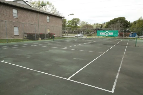 a view of a backyard with green space