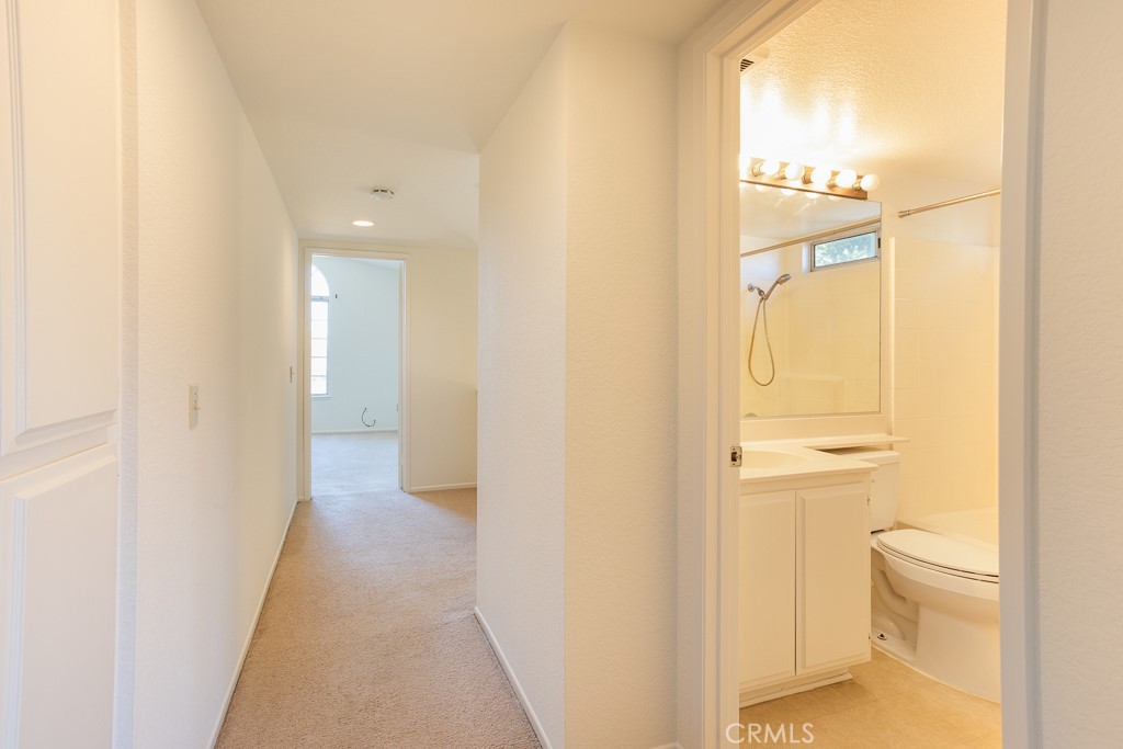 8424 Bayberry Road Rancho Cucamonga, CA 91730 - Photo 16 of 27 a bathroom with a granite countertop shower and a toilet