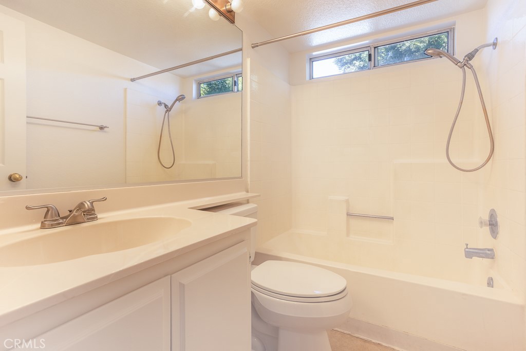 8424 Bayberry Road Rancho Cucamonga, CA 91730 - Photo 18 of 27 a bathroom with a sink a toilet and shower