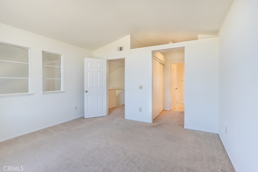 8424 Bayberry Road Rancho Cucamonga, CA 91730 - Photo 20 of 27 an empty room with windows and closet