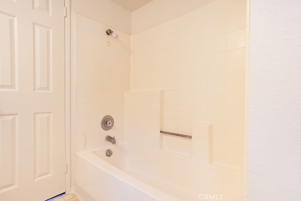 8424 Bayberry Road Rancho Cucamonga, CA 91730 - Photo 23 of 27 a bathroom with a bathtub