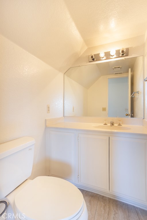 8424 Bayberry Road Rancho Cucamonga, CA 91730 - Photo 8 of 27 a bathroom with a sink and a toilet
