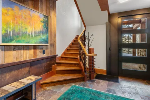 a view of entryway with a front door