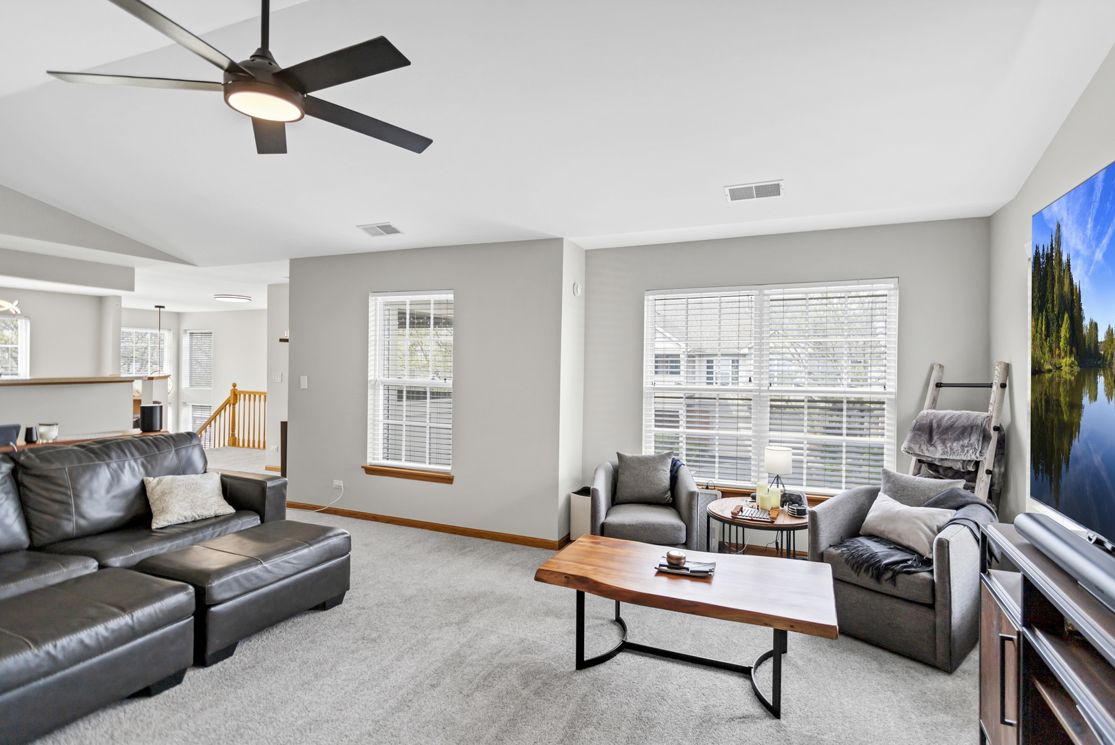 2262 Rockefeller Drive Geneva, IL 60134 - Photo 13 of 25 a living room with furniture ceiling fan and a window
