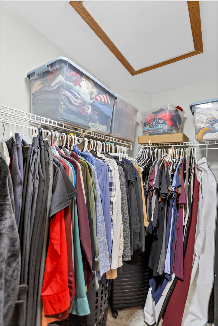2262 Rockefeller Drive Geneva, IL 60134 - Photo 18 of 25 a view of walk in closet with clothes