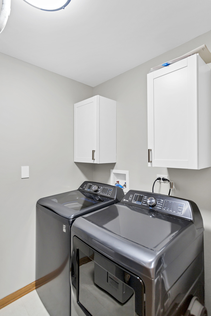 2262 Rockefeller Drive Geneva, IL 60134 - Photo 25 of 25 a kitchen with a sink a stove and cabinets