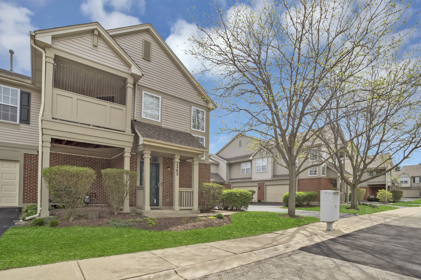 2262 Rockefeller Drive Geneva, IL 60134 - Photo 3 of 25 a front view of house with yard and green space
