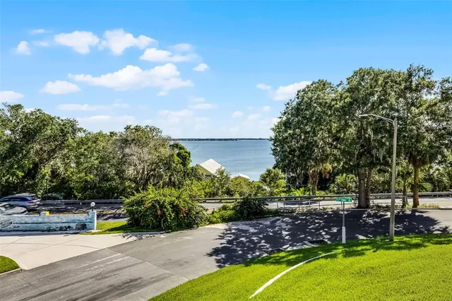 a view of a swimming pool with an outdoor space and seating area