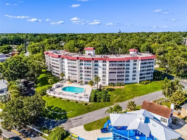a view of a chairs and table in the garden