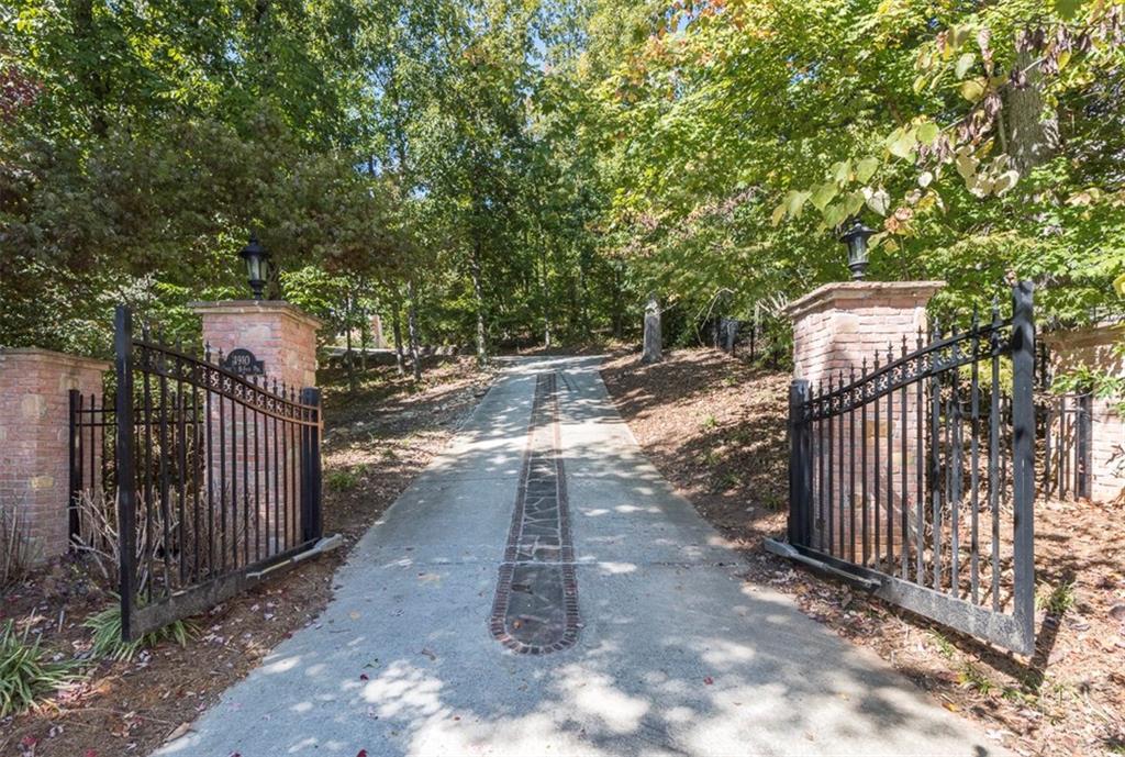 Gated entrance to private retreat nestled in a culdesac of Misty Creek Farm amid beautiful custom homes.