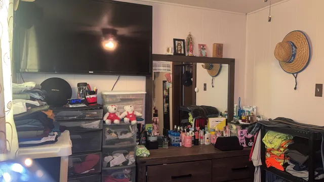 a living room with lots of furniture and decor