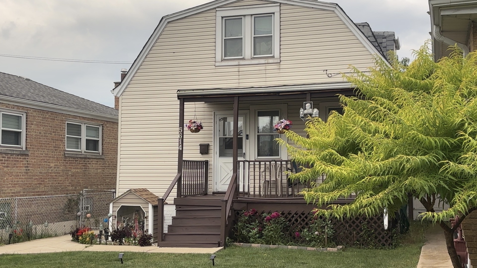 5614 South Kolmar Avenue Chicago, IL 60629 - Photo 2 of 40 a front view of a house with garden
