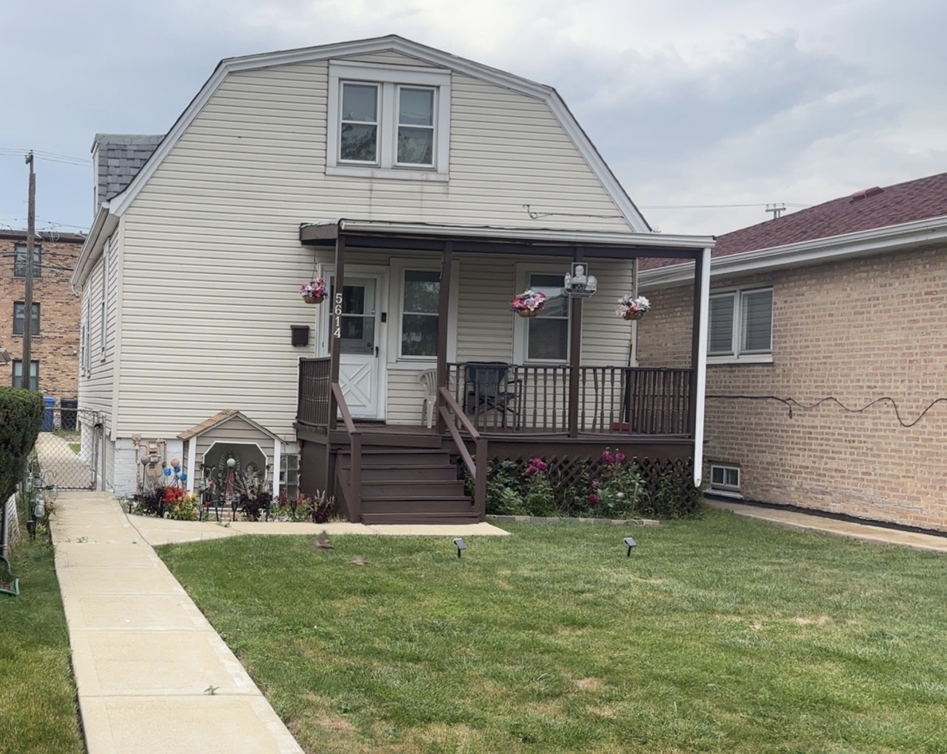 5614 South Kolmar Avenue Chicago, IL 60629 - Photo 3 of 40 a view of a house with a yard