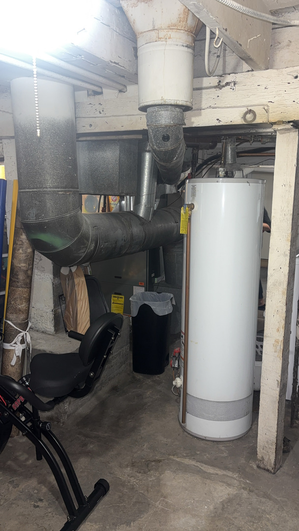 5614 South Kolmar Avenue Chicago, IL 60629 - Photo 35 of 40 a room with storage and utility