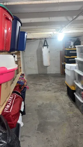 a room with lots of furniture and a kitchen